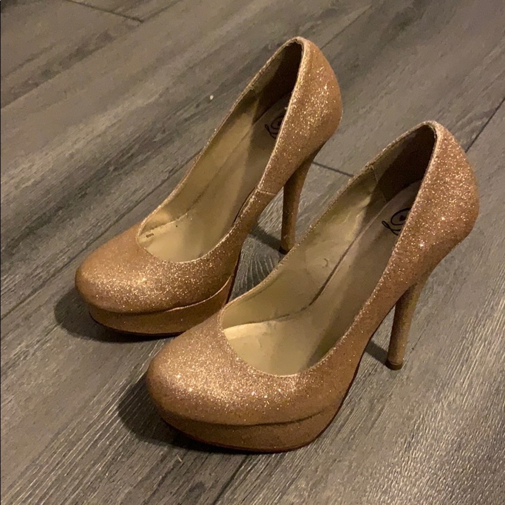 Gold high heels
